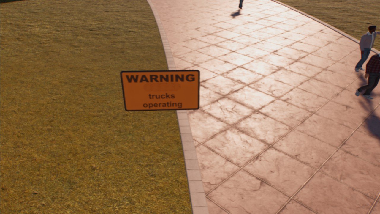 Warning Trucks Operating Sign